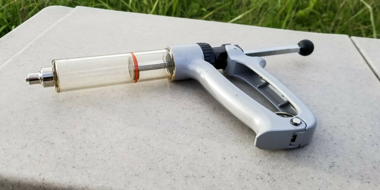 CattleVacBox Repeater Syringe on Boss Vaccine Cooler